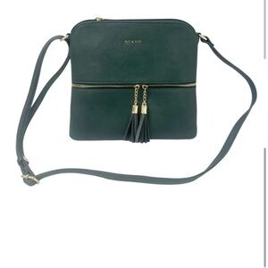 Crossover bag with adjustable straps zippered pocket on the front